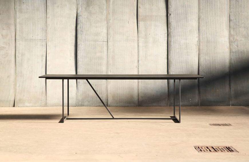 Mesa Nero – a table in distressed French oak by Heerenhuis at Different Like a Zoo